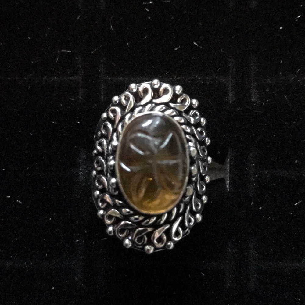 8.5 sterling silver carved synthetic amber